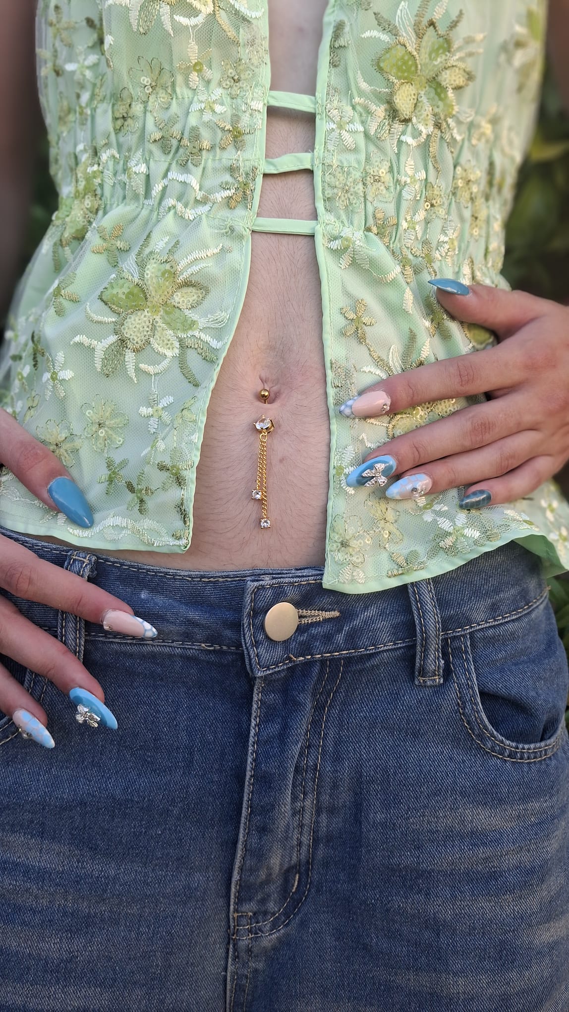 Piercing nombril Plume
