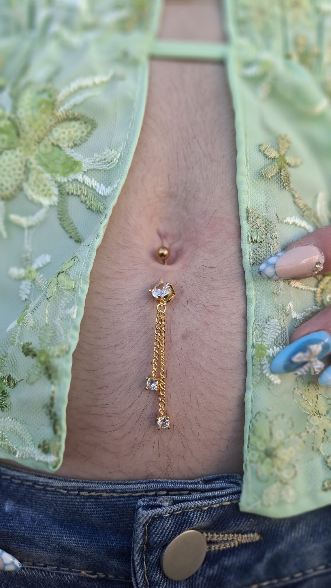 Piercing nombril Plume